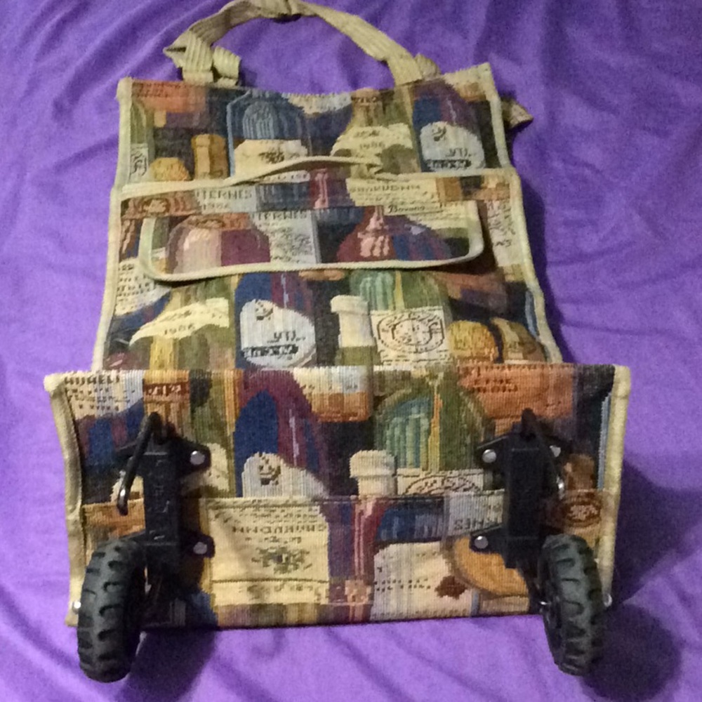 Bovano Rolling Tapestry Bag. Folds up for ease.